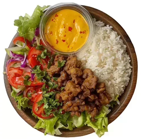 Mexican Chicken — Fragrant lemon rice topped with sautéed chicken, mixed veggies, salad, and spicy mayo