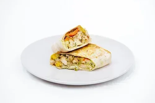 Mystic Mayan Fajita — Sauteed chicken in tortilla wrap with veggies, pepper sauce, guacamole, cheddar cheese and sour cream
