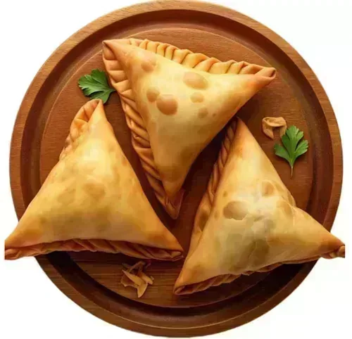 Wicked Samosas — Large vegetable samosas, served with tamarind sauce on the side